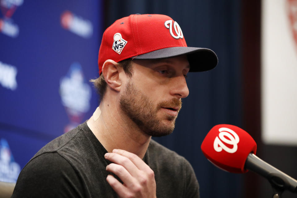 Washington Nationals starting pitcher Max Scherzer speaks during a news conference before Game 5 of the baseball World Series against the Houston Astros Sunday, Oct. 27, 2019, in Washington. Scherzer was slated to start Sunday's World Series game, has been scratched with spasms in his neck and right trapezius.(AP Photo/Alex Brandon)