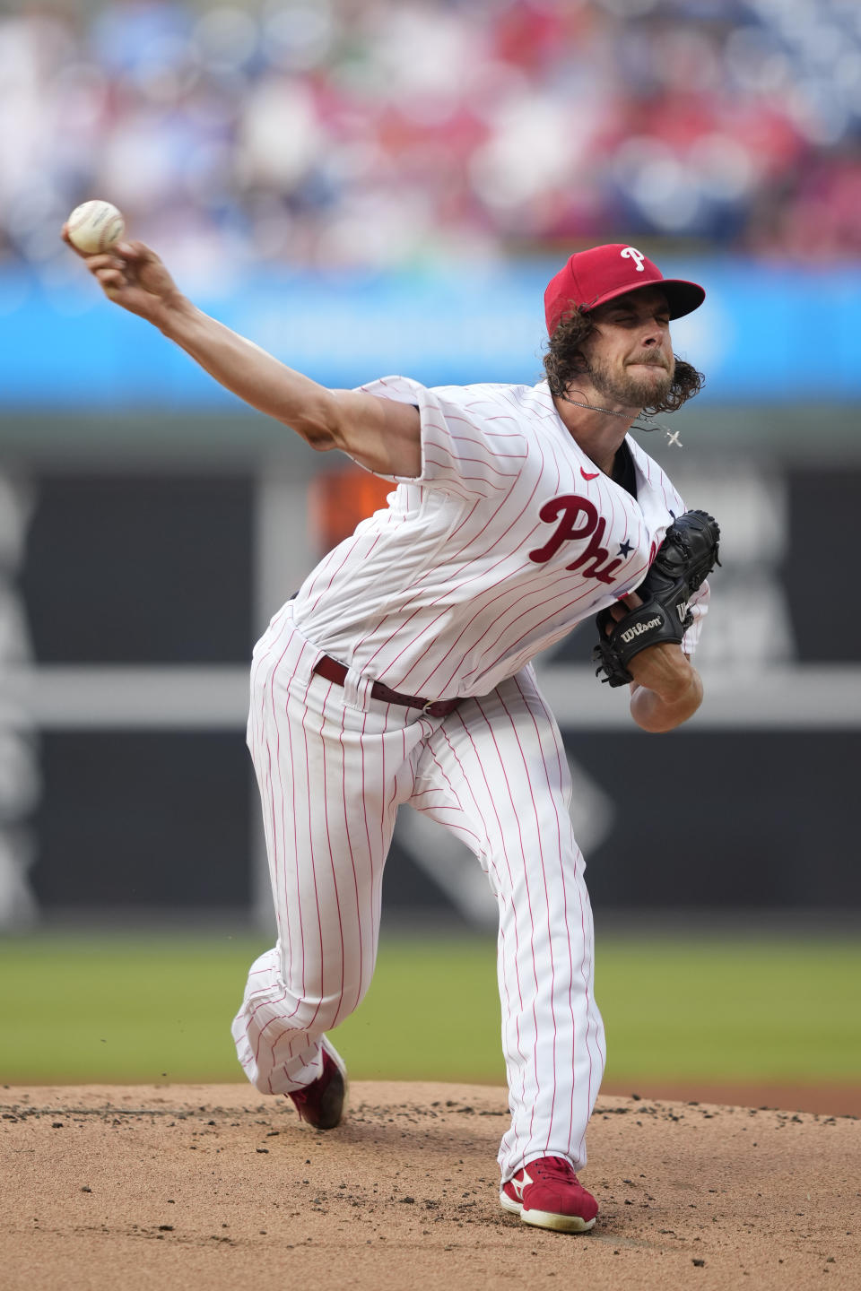 Philadelphia Phillies' Aaron Nola pitches during the first inning of a baseball game against the Milwaukee Brewers, Tuesday, July 18, 2023, in Philadelphia. (AP Photo/Matt Slocum)