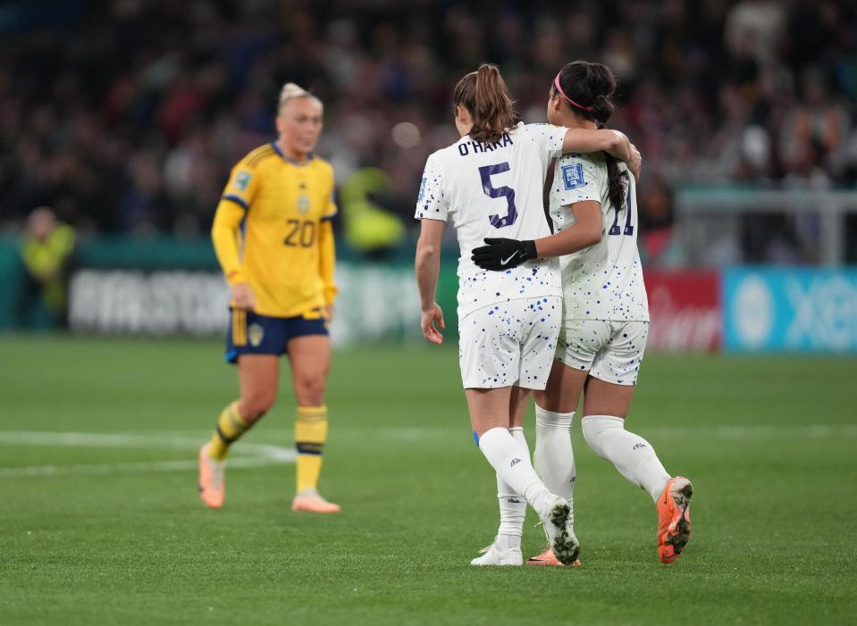 U.S. forward Sophia Smith (11) is consoled by defender Kelley O'Hara after missing a penalty kick against Sweden.