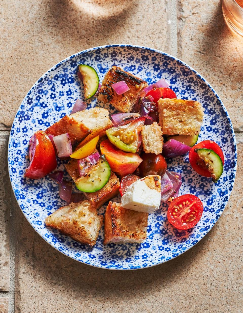 <p>Panzanella is one of those summer recipes that truly tastes like summer. It's one that you want to make in peak season—when the tomatoes are extra juicy, the squash slightly sweet, and the basil extra cheap. To give this classic dish more flavor, we grill the bread, zucchini, and onion until charred, then toss those with the remaining ingredients.</p><p>Get the <strong><a href="https://www.delish.com/cooking/recipe-ideas/recipes/a47246/summer-panzanella-recipe/" rel="nofollow noopener" target="_blank" data-ylk="slk:Summer Panzanella recipe;elm:context_link;itc:0;sec:content-canvas" class="link ">Summer Panzanella recipe</a></strong>.</p>