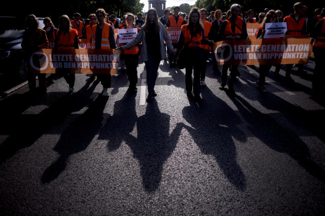 German police conduct raids on climate activists as impatience mounts