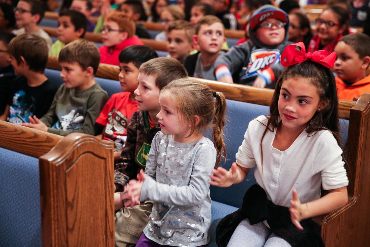 More than 350 students listen to a show during the castle-themed House of Faith Christmas party Tuesday, Dec. 5, 2017, at Christian Church of San Angelo. 
