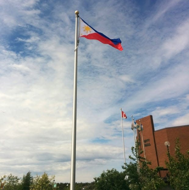 The flag of the Philippines is flying around Canada this month for Filipino Heritage Month.  (Rignam Wangkhang - image credit)