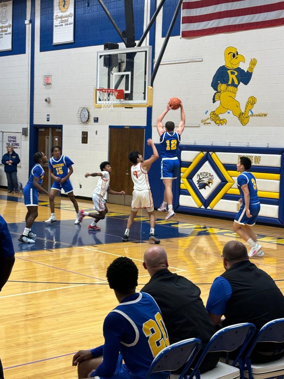 North Brunswick’s Jack Garbolino has the ball in a boys basketball game against Edison on Jan. 25, 2024