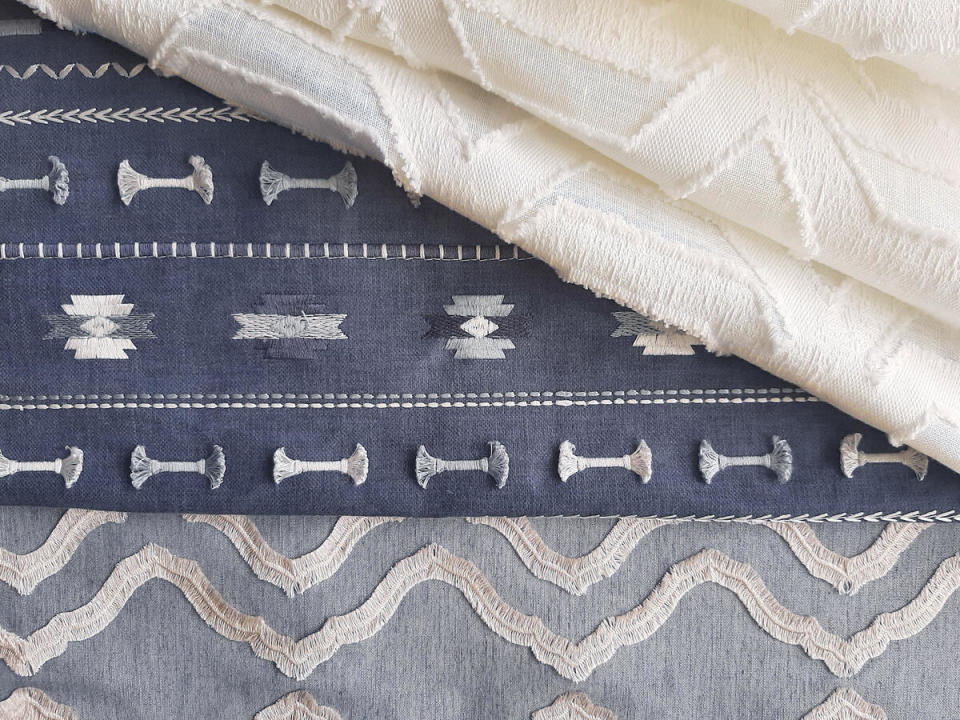 Single Handed Ivory, Follow Me Chambray and Put a Bow on It Indigo by Carole Fabrics, available for window fabrics at select Hunter Douglas dealers