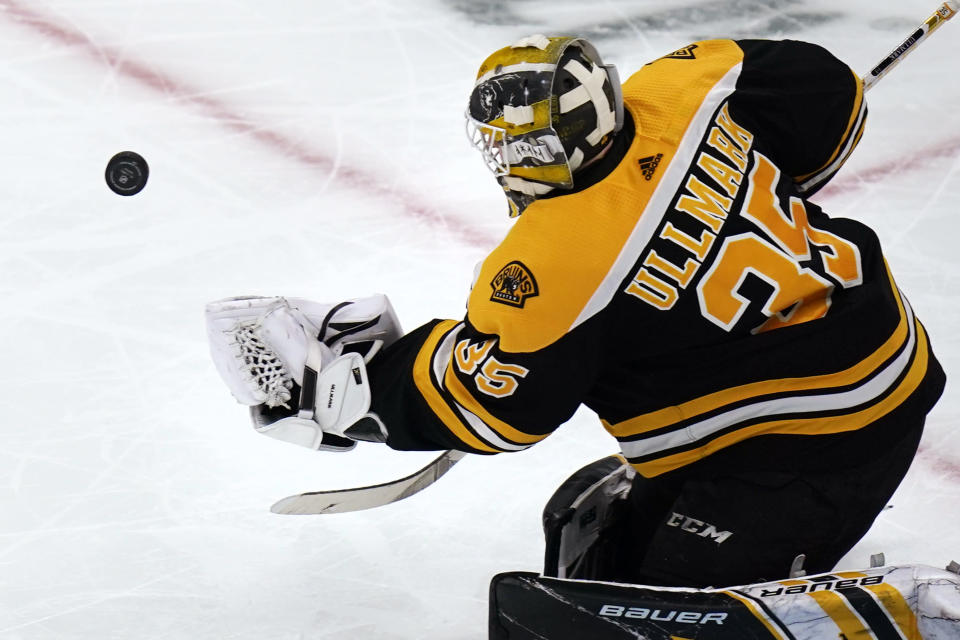 Boston Bruins goaltender Linus Ullmark (35) makes a save during the second period of an NHL hockey game against the Carolina Hurricanes, Tuesday, Jan. 18, 2022, in Boston. (AP Photo/Charles Krupa)