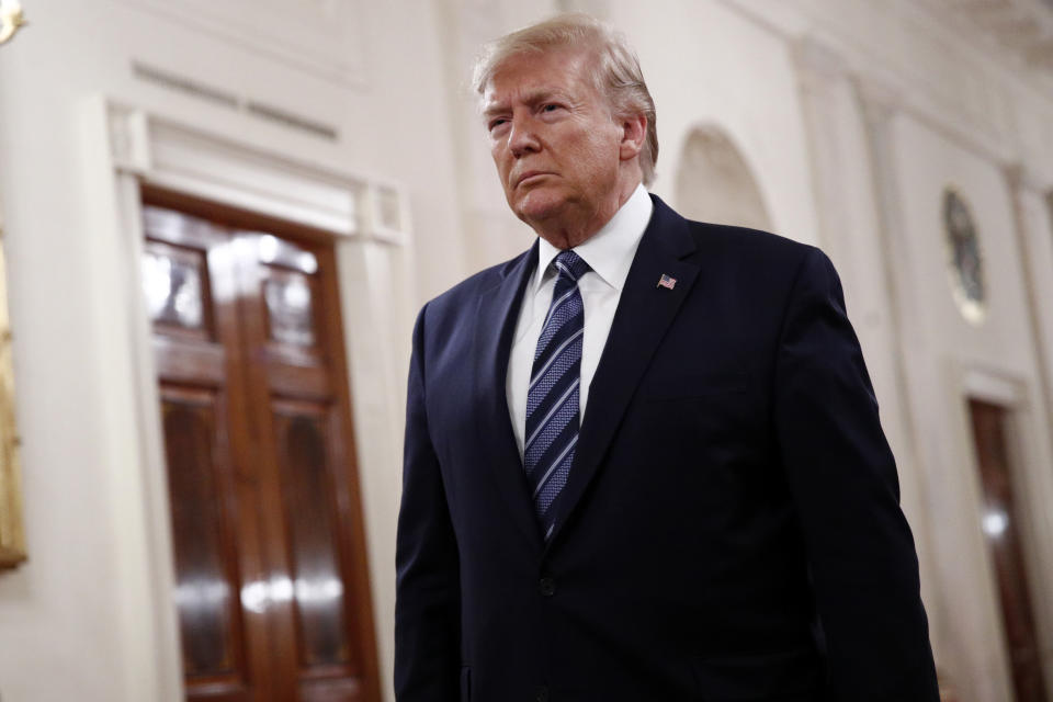 President Donald Trump arrives to speak at a ceremony to present the Presidential Citizens Medal posthumously to Rick Rescorla in the East Room of the White House, Thursday, Nov. 7, 2019, in Washington. (AP Photo/Patrick Semansky)