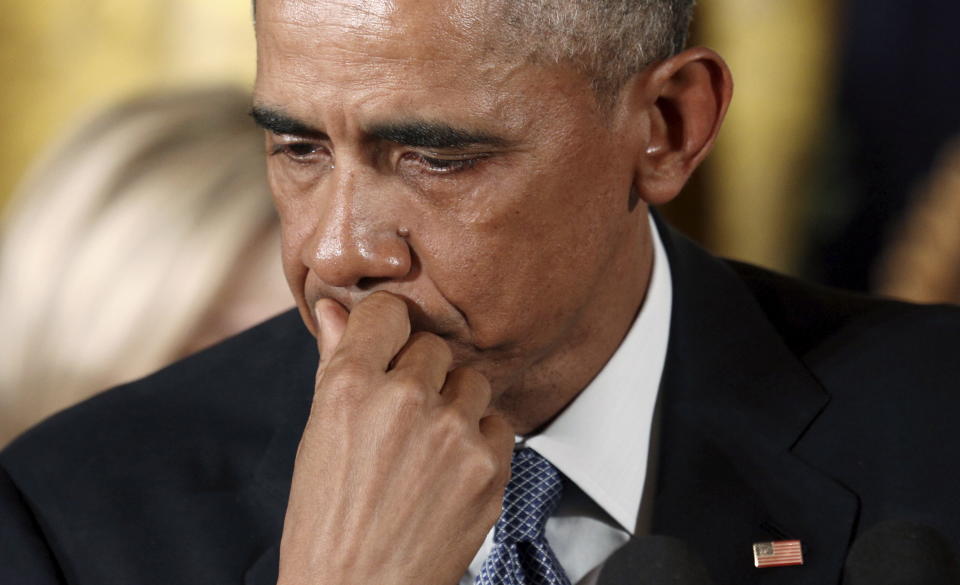Former President Barack Obama looking pensive.