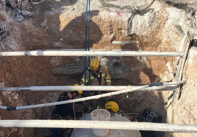 <em>Clark County Fire Department uses heavy rescue equipment to lift injured worker out of trench. (Credit: CCFD)</em>