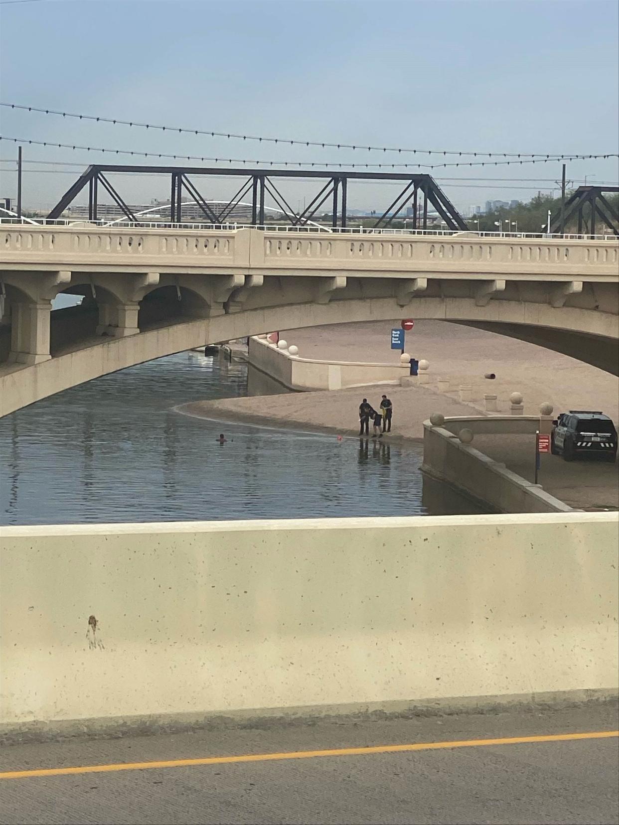 Officers pulled a man out of Tempe Town Lake on Tuesday morning.