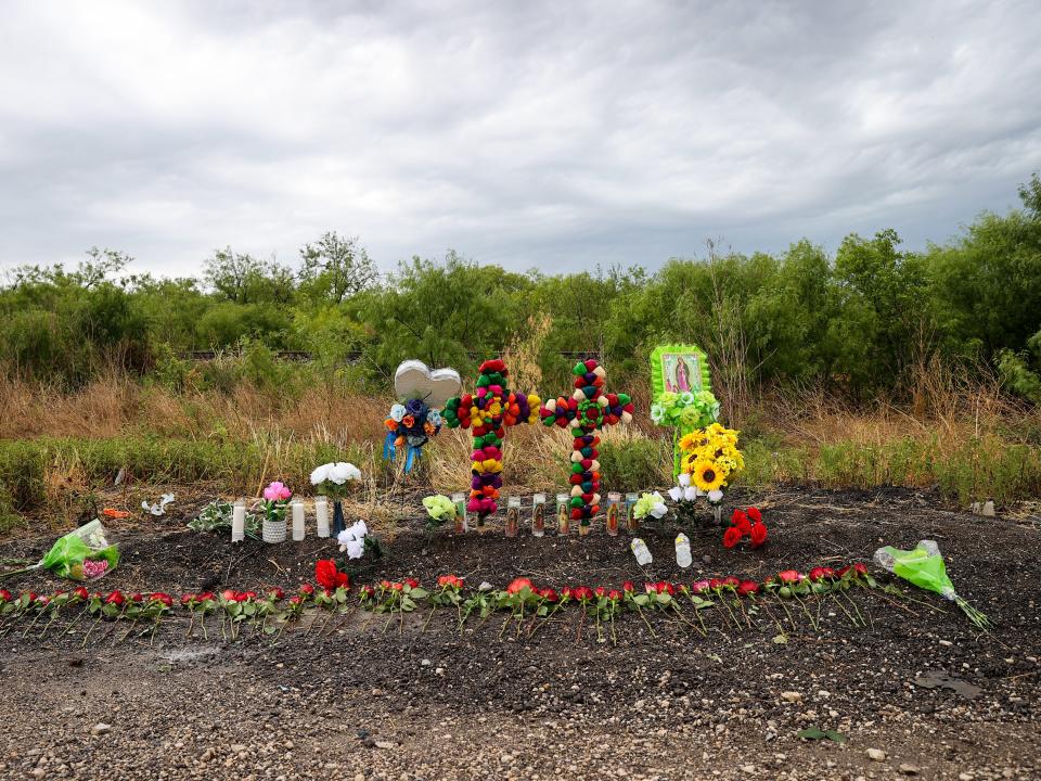 Colorful crosses are left after police impounded the trailer truck on June 28 in San Antonio, Texas. Dozens believed to be crossing into the US from Mexico, Guatemala and Honduras were found dead it.