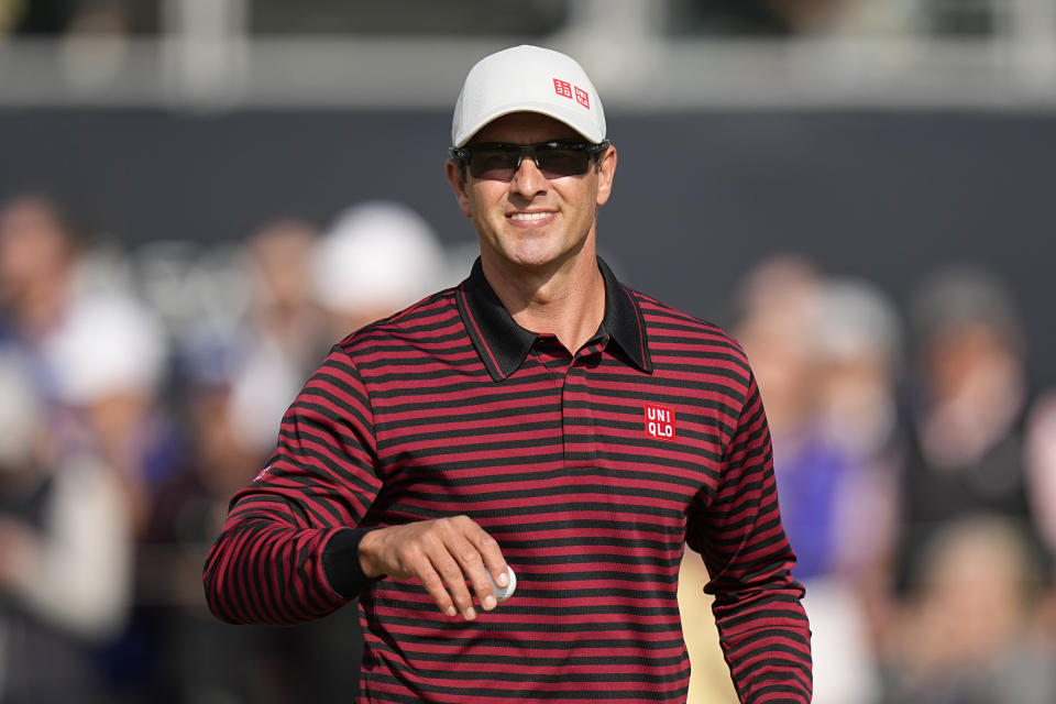 Adam Scott, of Australia, waves after his putt on the sixth hole during the first round of the PGA Championship golf tournament at Oak Hill Country Club on Thursday, May 18, 2023, in Pittsford, N.Y. (AP Photo/Eric Gay)