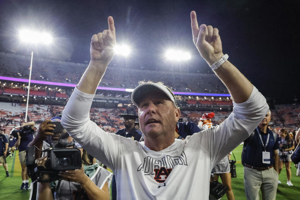 Auburn head coach Hugh Freeze thanks the fans after an NCAA college football game against Samford, Saturday, Sept. 16, 2023, in Auburn, Ala. (AP Photo/Butch Dill)