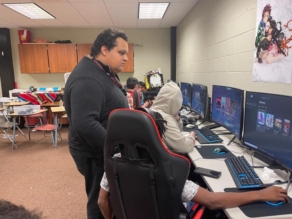 McKinley esports head coach Tyler Smith oversees a practice session