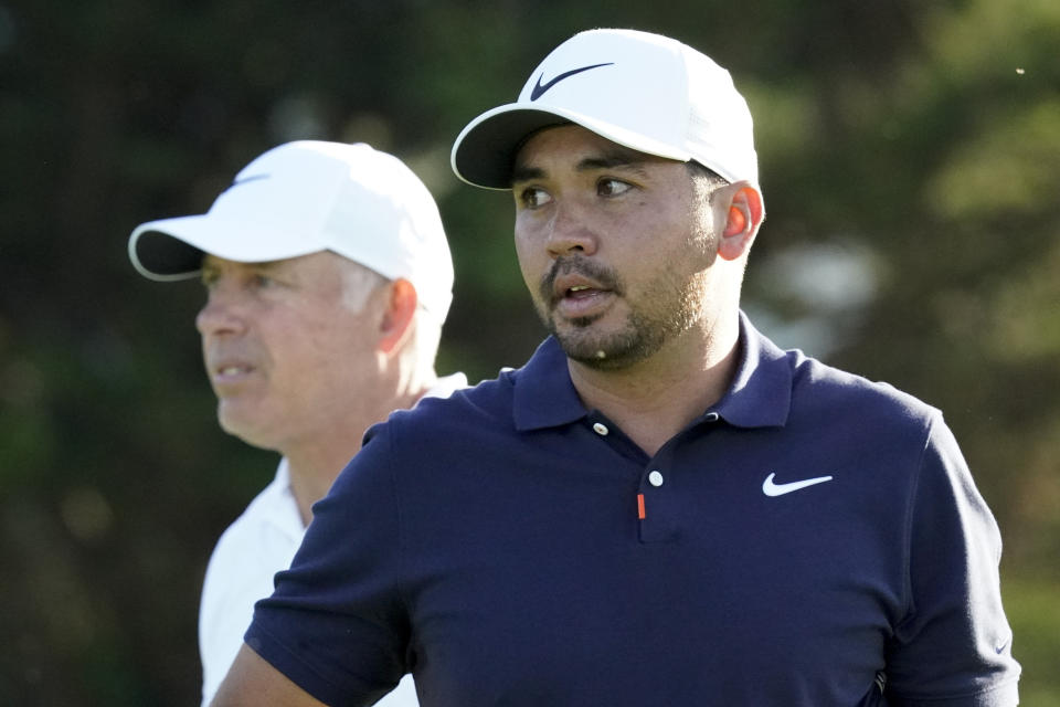 Jason Day, of Australia, and caddie Steve Williams walk on the 13th hole during a practice round for the U.S. Open Championship golf tournament Tuesday, June 11, 2019, in Pebble Beach, Calif. (AP Photo/David J. Phillip)