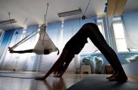Dunia Skaunicova prepares for a yoga class in Prague