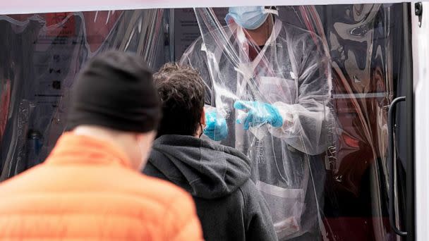 PHOTO: A medical worker administers tests at a Covid-19 testing site in Brooklyn, New York, April 18, 2022. (Spencer Platt/Getty Images, FILE)