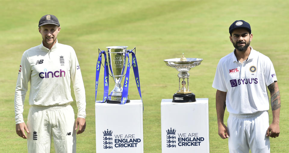 England captain Joe Root, left, and India captain Virat Kohli pose with throphys prior to the first Test Match between England and India at Trent Bridge cricket ground in Nottingham, England, Monday, Aug. 2, 2021. (AP Photo/Rui Vieira)