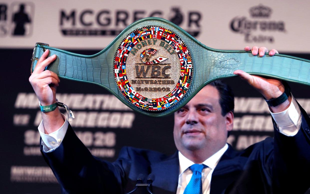 WBC President Mauricio Sulaiman shows off the new belt - Reuters 