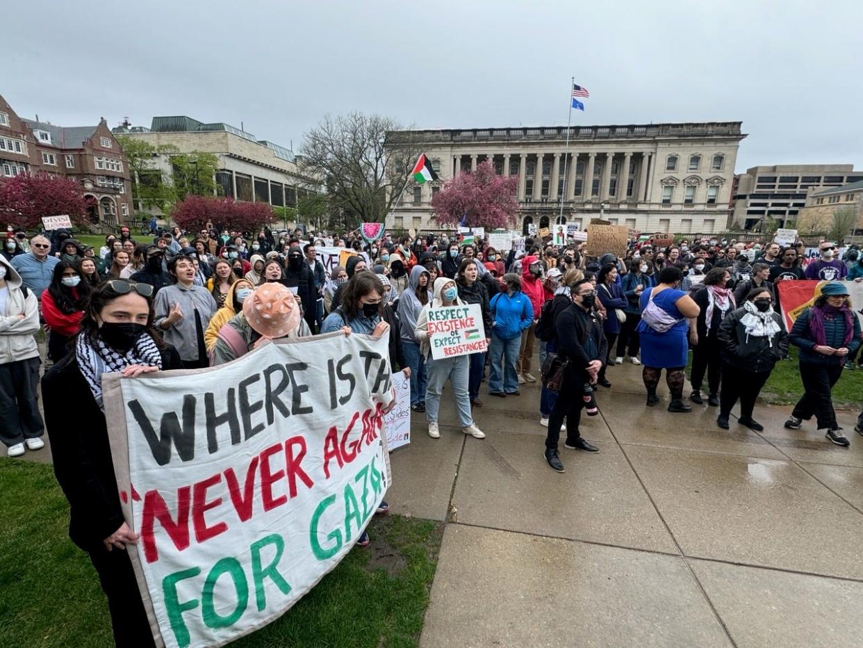 Demonstrators protest the Israel-Hamas war on the University of Wisconsin-Madison campus on Monday. Student protesters around the country have demanded colleges cut financial ties to Israel.