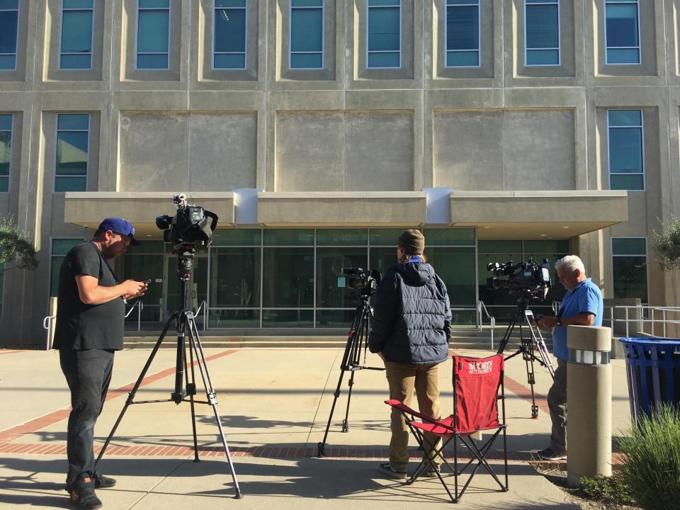 Videographers set up outside Monterey County Superior Courthouse in Salinas on Monday as opening statements begin in the trial of Paul and Ruben Flores in the 1996 murder of Stockton college student Kristin Smart.