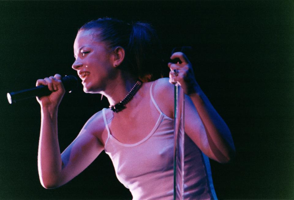 BIRMINGHAM, UNITED KINGDOM - JANUARY 17: Shirley Manson of Garbage performs on stage at the National Exhibition Centre (NEC), on January 17th, 1999 in Birmingham, England. (Photo by Pete Still/Redferns)