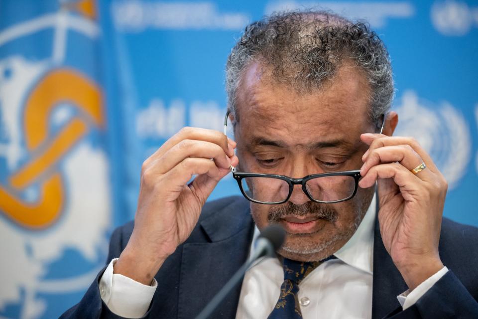 WHO Director-General Tedros Adhanom Ghebreyesus adjusts his glasses during a press conference at the World Health Organisation's headquarters in Geneva, on December 14, 2022. (Photo by Fabrice COFFRINI / AFP) (Photo by FABRICE COFFRINI/AFP via Getty Images)