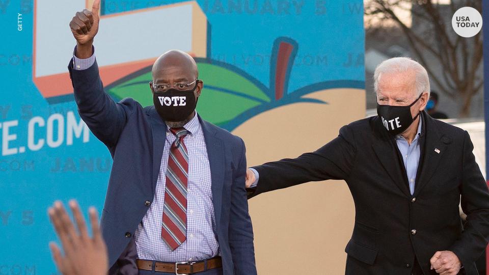 Sen. Raphael Warnock and President Joe Biden