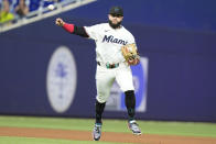 Miami Marlins third baseman Emmanuel Rivera throws to first base for an out during the seventh inning of a baseball game against the Colorado Rockies, Wednesday, May 1, 2024, in Miami. (AP Photo/Marta Lavandier)