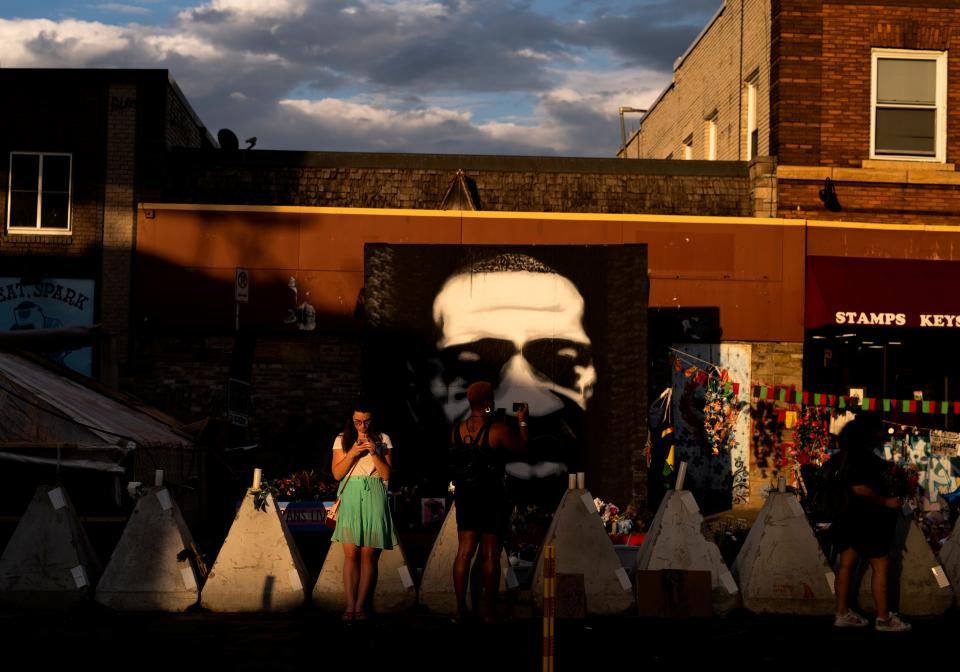 People gather at George Floyd Square in Minneapolis.