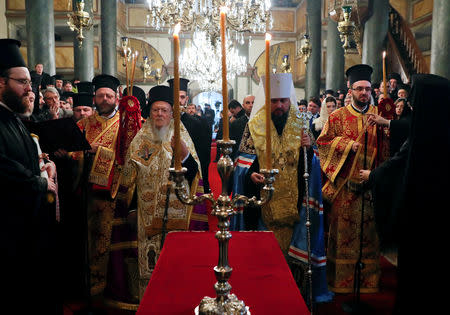 Metropolitan Epifaniy, head of the Orthodox Church of Ukraine, and Ecumenical Patriarch Bartholomew attend a ceremony marking the new Ukrainian Orthodox church's independence, at St. George's Cathedral, the seat of the Ecumenical Patriarchate, in Istanbul, Turkey January 5, 2019. REUTERS/Murad Sezer