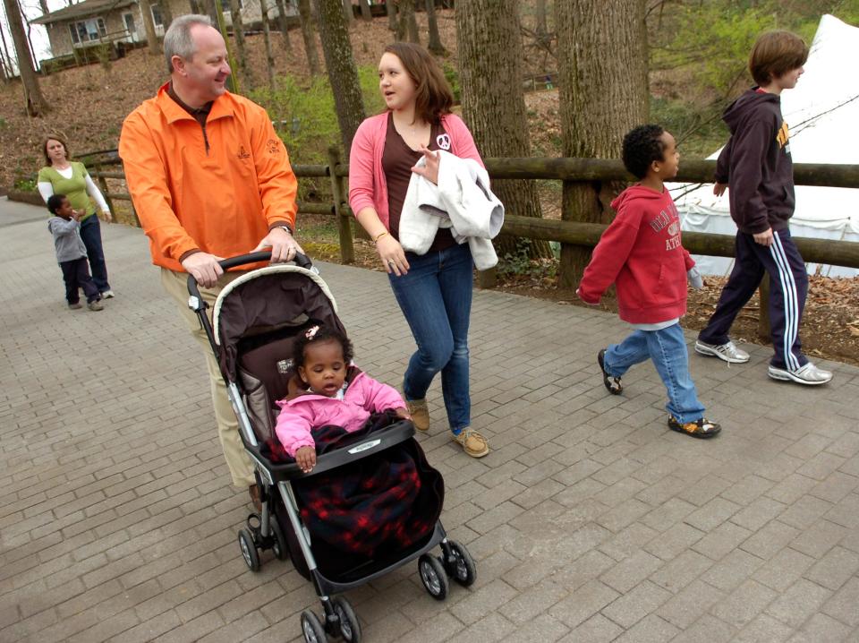The Hamilton Family takes a trip around the zoo with (left to right) Kiya, Beth, Mike, Kalu, Madison, Nate and Matt on Tuesday, March 30, 2010. Nate, Kiya and Kalu were siblings adopted from Ethiopia in 2009. Mike Hamilton is the athletic director at the University of Tennessee.