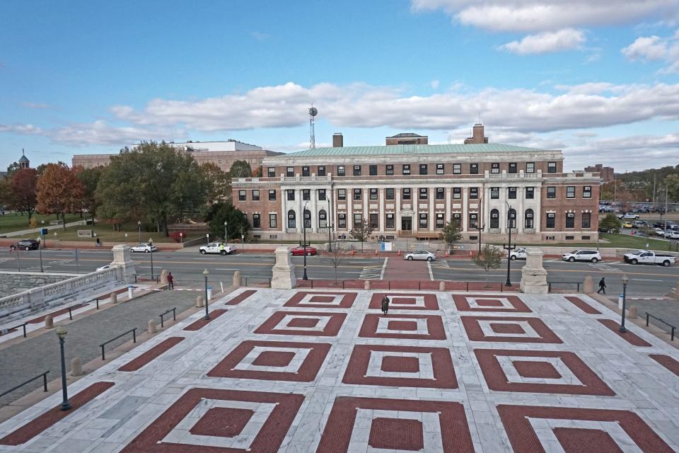 The Department of Administration, left behind the trees, and the Department of Transportation, right, are on Providence's Capitol Hill. Or are they?