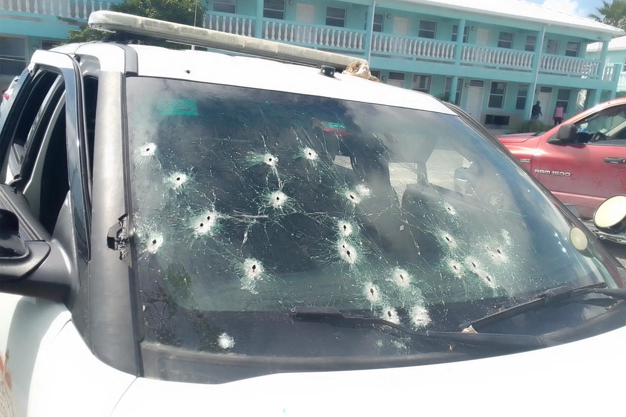 A police vehicle intercepted the suspected gunmen and riddled with bullets during a shootout, officials said. (Royal Turks and Caicos Islands Police)