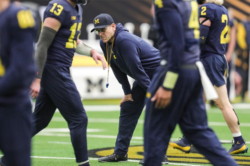 Michigan head coach Jim Harbaugh watches open practice at NRG Stadium in Houston, Texas on Saturday, Jan. 6, 2024, two days before the national championship game vs. Washington.