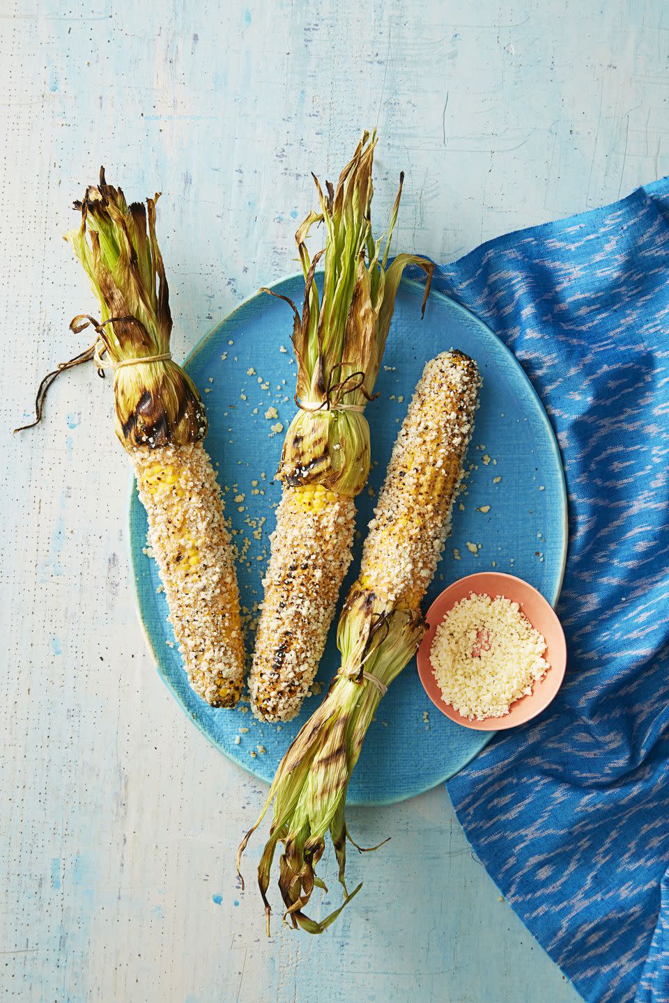 <p>Grilled corn gets even better with zesty, spicy, and smoky toppings. Oh, and plenty of crumbled Cotija cheese.</p><p><em><a href="https://www.goodhousekeeping.com/food-recipes/a38825/mexican-grilled-corn-recipe/" rel="nofollow noopener" target="_blank" data-ylk="slk:Get the recipe for Mexican Grilled Corn »;elm:context_link;itc:0;sec:content-canvas" class="link ">Get the recipe for Mexican Grilled Corn »</a></em> </p>