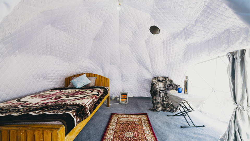 A heated, powered, geodesic-dome accommodation at base camp