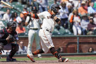 San Francisco Giants' Brandon Crawford strikes out swinging during the third inning of a baseball game against the Arizona Diamondbacks in San Francisco, Thursday, Aug. 18, 2022. (AP Photo/Godofredo A. Vásquez)