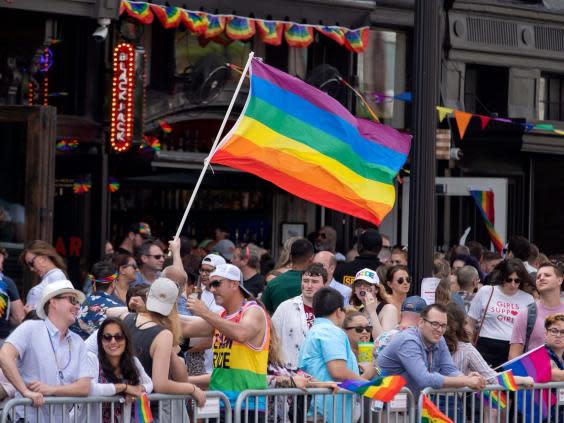 People gather to watch the DC Pride Parade in Washington, DC (EPA)
