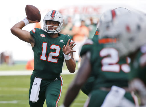 Miami quarterback Malik Rosierthrows a pass during the first half against Syracuse. (AP Photo)