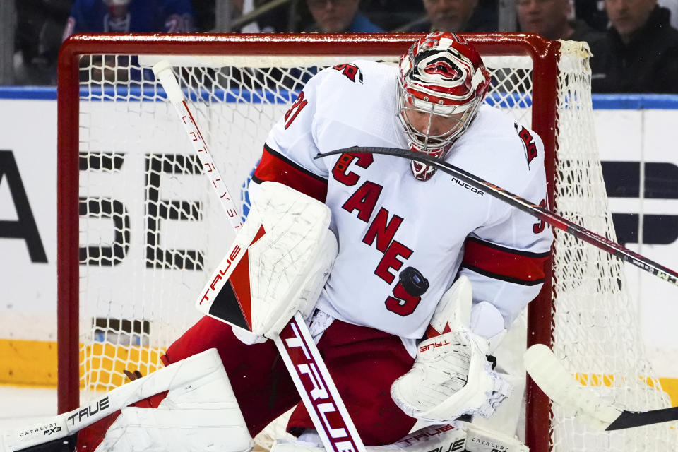 Carolina Hurricanes goaltender Frederik Andersen makes a save against the New York Rangers during the first period in Game 1 of an NHL hockey Stanley Cup second-round playoff series, Sunday, May 5, 2024, in New York. (AP Photo/Julia Nikhinson)