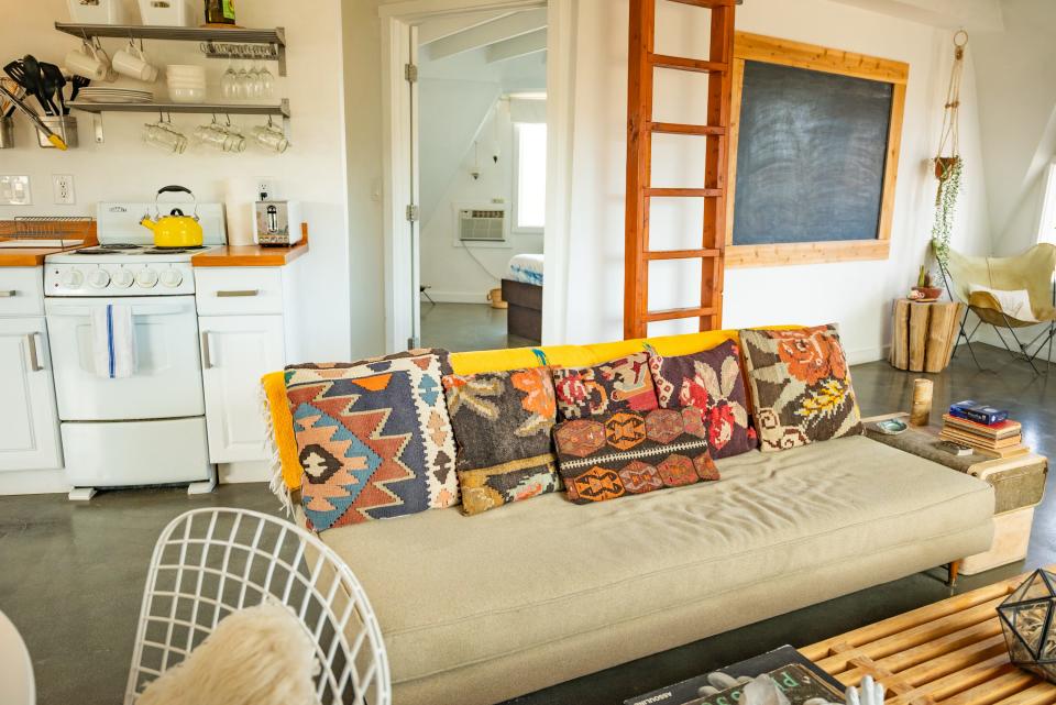 Couch with colorful pillows in Joshua tree dome