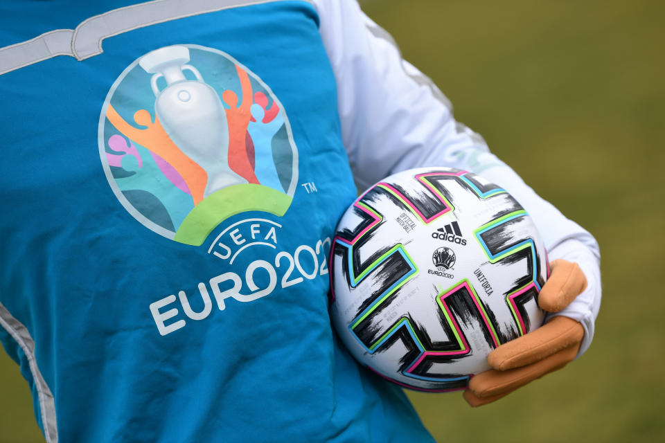 UEFA Euro 2020 mascot Skillzy poses for a photo with the official match ball at Olympiapark in Munich, Germany, March 3, 2020. REUTERS/Andreas Gebert