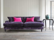 <p>A wonderful blend of classic and modern design, this Ultra Violet sofa has traditional buttoning with a comfortable foam core seat. Lovers of the hottest trends will appreciate this luxurious sofa. </p><p><strong>BUY NOW:</strong> <a rel="nofollow noopener" href="https://www.darlingsofchelsea.co.uk/charnwood-range" target="_blank" data-ylk="slk:Charnwood Sofa, £3150, Darlings of Chelsea;elm:context_link;itc:0;sec:content-canvas" class="link ">Charnwood Sofa, £3150, Darlings of Chelsea</a></p>