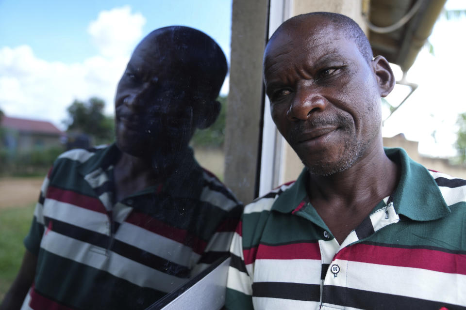 Frederick Kazigwemo, a leader in the village who was jailed for nine years for genocide-related crimes is photographed at the reconciliation village of Mbyo, in Nyamata, Rwanda, Friday, April 5, 2024. Thirty years after the genocide the country has fourteen "reconciliation villages" where convicted perpetrators who have been released from prison after publicly apologizing for their crimes live side by side with genocide survivors. (AP Photo/Brian Inganga)