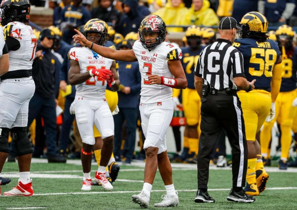 Maryland quarterback Taulia Tagovailoa (3) celebrates a first down against Michigan during the first half at Michigan Stadium in Ann Arbor on Saturday, Sept. 24, 2022.