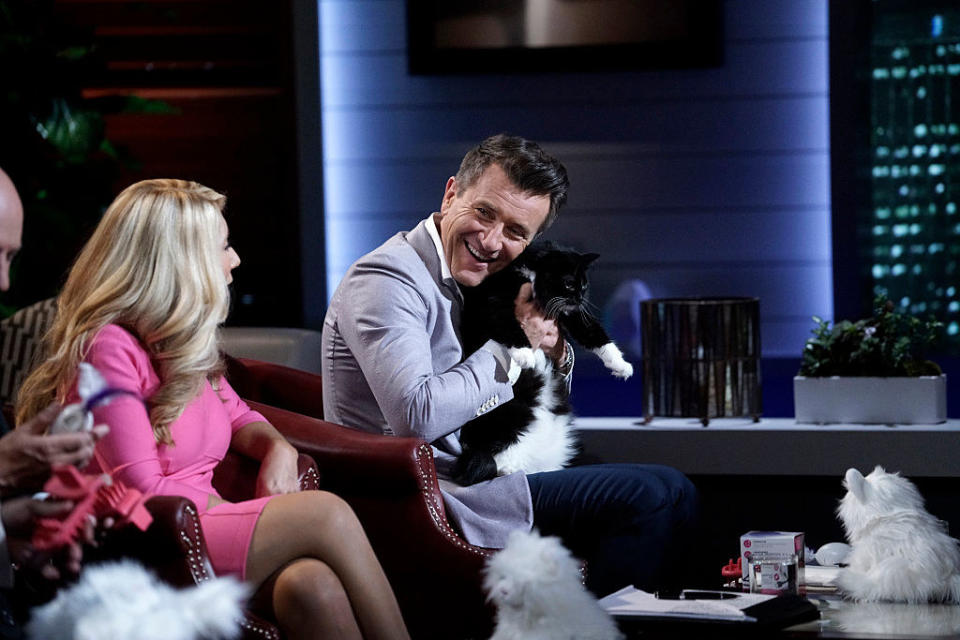 Robert Herjavec holding a cat