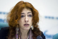 FILE - In this Jan. 29, 2015, file photo, program director and senior researcher at Human Rights Watch's Europe and Central Asia division Tanya Lokshina speaks at a news conference in Moscow, Russia. A smartphone app designed to track Moscow's quarantined coronavirus patients was rolled out by city officials in early April, but complaints about it have mushroomed, with people saying the app has glitches and wrongfully imposed fines on them. Lokshina said such apps are used in many countries, but she hasn't seen one that elicited such a huge amount of complaints. (AP Photo/Pavel Golovkin, File)