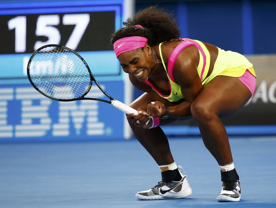 Williams of the U.S. reacts after winning a point against Van Uytvanck of Belgium during their women's singles first round match at the Australian Open 2015 tennis tournament in Melbourne