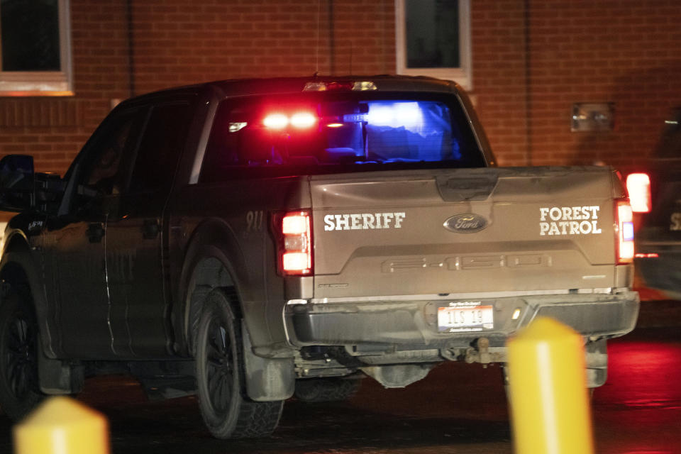 The truck with with paper blocking some of its windows and believed to be transporting Bryan Kohberger, who is accused of killing four University of Idaho students in November 2022, arrives in a police motorcade at the Latah County Courthouse, Wednesday, Jan. 4, 2023, in Moscow, Idaho, following Kohberger's extradition from Pennsylvania. (AP Photo/Ted S. Warren)